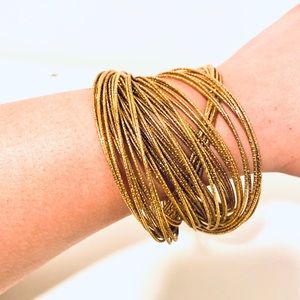 Fashion yellow gold rolling bracelet bangle 2.5 in